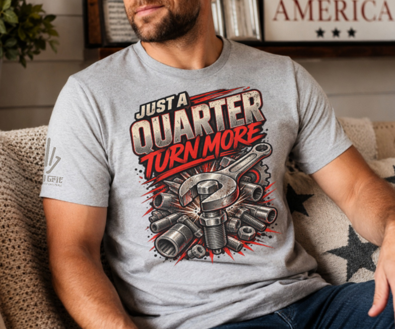 Mechanic shirt design featuring a large wrench, threaded bolt, and the phrase “Just a Quarter Turn More.”
