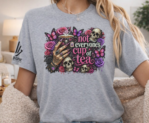 Not Everyone’s Cup of Tea graphic tee with goth hand, skulls, and roses