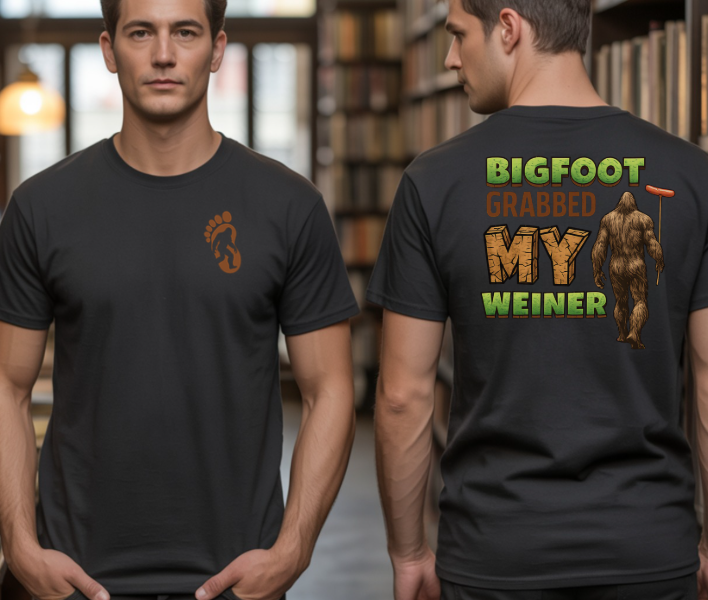 Graphic tee featuring Bigfoot holding a hot dog on a stick with humorous text