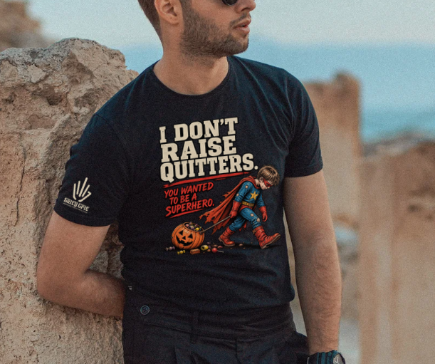 Sarcastic parent graphic tee featuring a tired child in a superhero costume