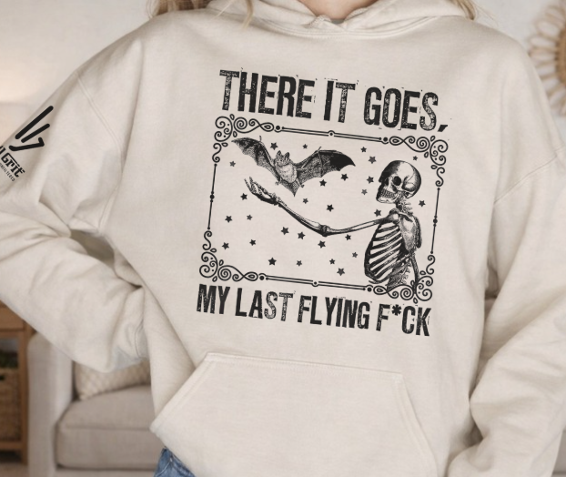 Funny sarcastic hoodie featuring skeleton releasing a bat