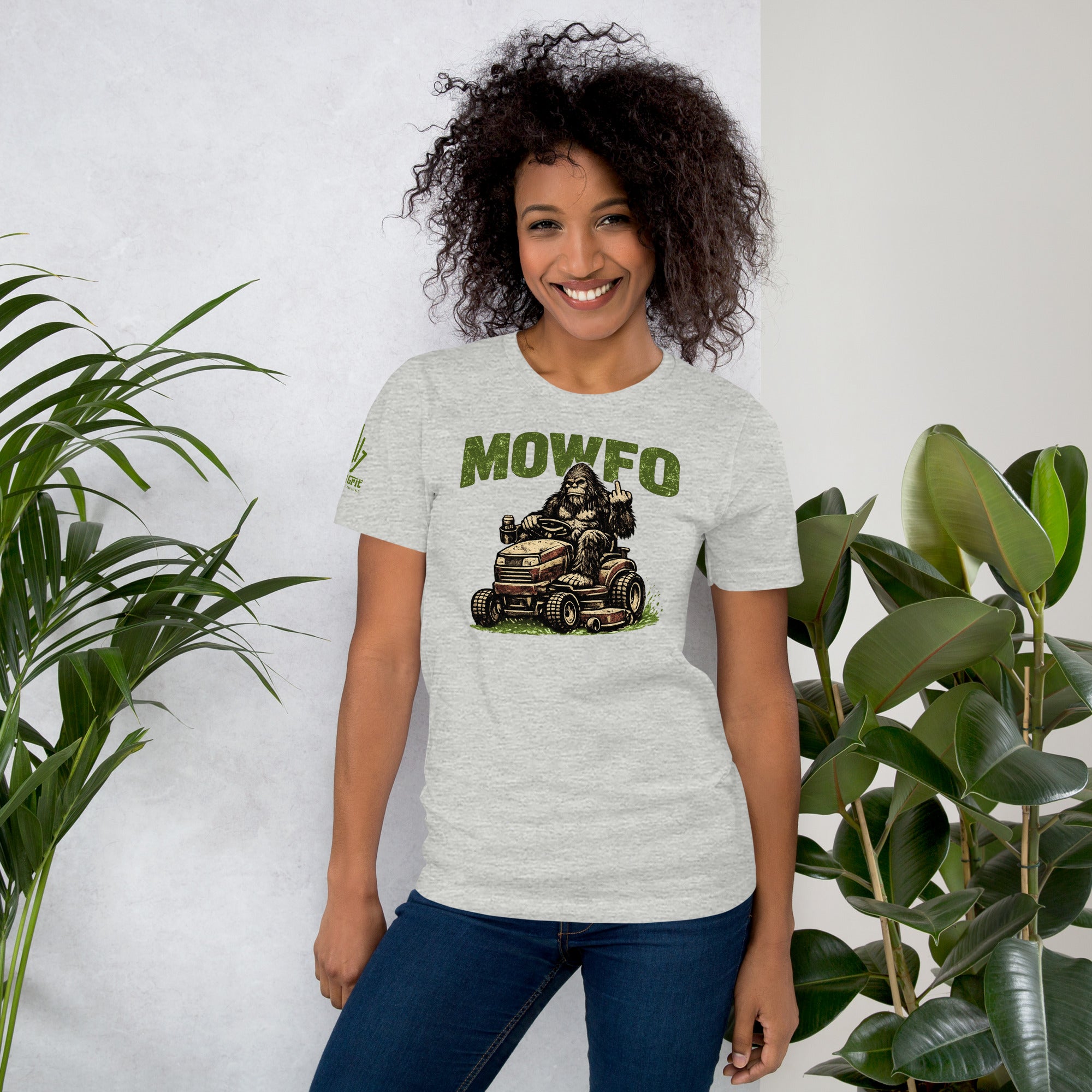 Sarcastic graphic shirt featuring MOWFO Bigfoot riding a lawn mower