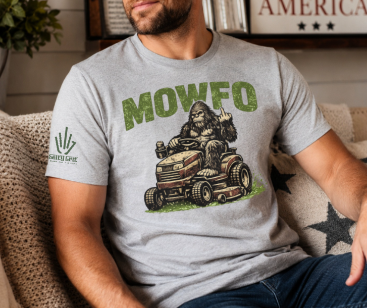 Funny MOWFO shirt featuring Bigfoot riding a lawn mower and giving the middle finger