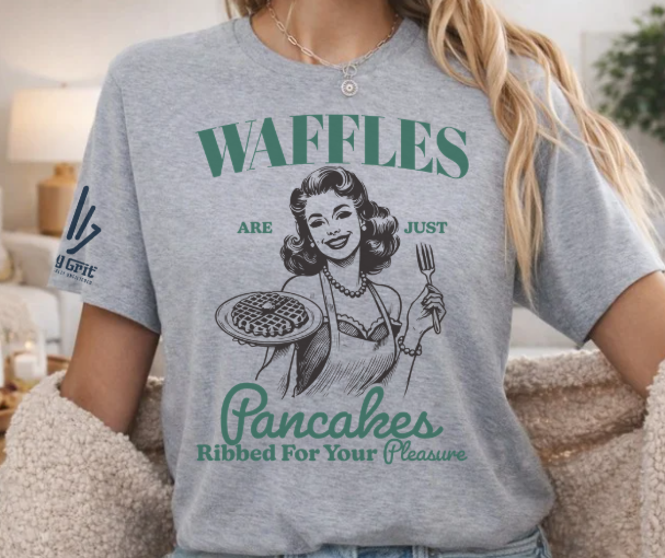 Funny Waffles Are Just Pancakes shirt featuring a retro 70s woman holding waffles