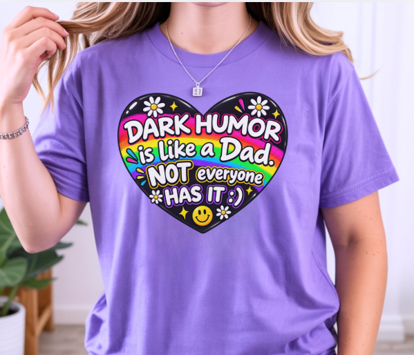 Funny shirt featuring Dark Humor Is Like a Dad with a vintage 70s heart design