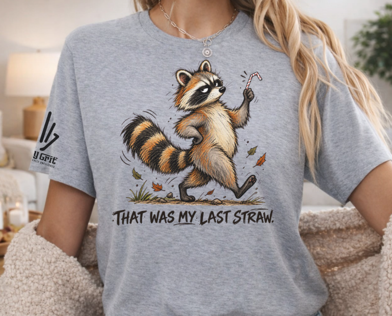Sarcastic raccoon graphic shirt with bent straw design