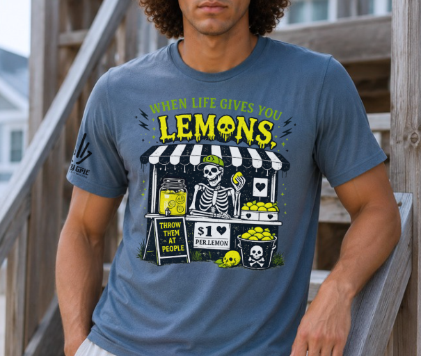 Graphic tee featuring a skeleton selling lemons at a lemonade stand with sarcastic humor