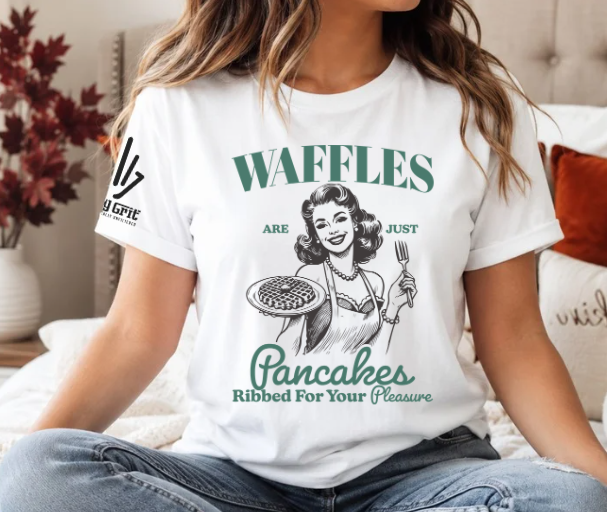Funny retro waffle graphic tee featuring a woman holding a plate of waffles