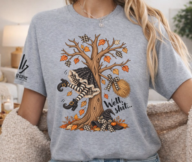 Funny witch Halloween graphic tee with Well Shit crash design